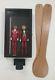 (2) 10 In. Hand Carved Stick Puppets On Paddle, Glass Display Case, 1 Chair