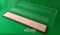 42L x 6W x 8H display case with 3/16 thick acrylic, brown wood frame base