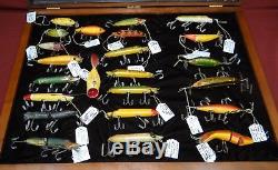 Collection of Antique Heddon Fishing Lures in Walnut Display Case