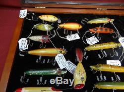 Collection of Antique Heddon Fishing Lures in Walnut Display Case