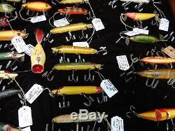 Collection of Antique Heddon Fishing Lures in Walnut Display Case