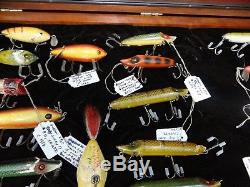 Collection of Antique Heddon Fishing Lures in Walnut Display Case
