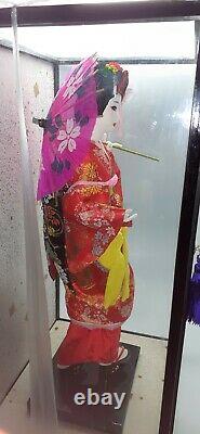 Japanese geisha doll in glass/wood display case