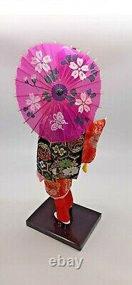 Japanese geisha doll in glass/wood display case