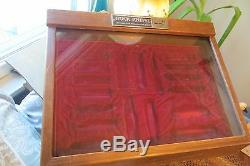 Store BUCK KNIVES FAMOUS FOR HOLDING AN EDGE DISPLAY WOOD CASE, GLASS FRONT