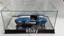 The 112 Scale Glass and Wood Display Case for Scale Model Cars by Unkown