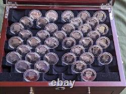 The JFK Golden Anniversary Collection 130 Half Dollars in Wood Display Case